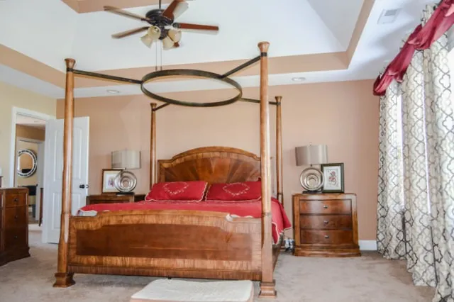 a hall with a sink and a mirror