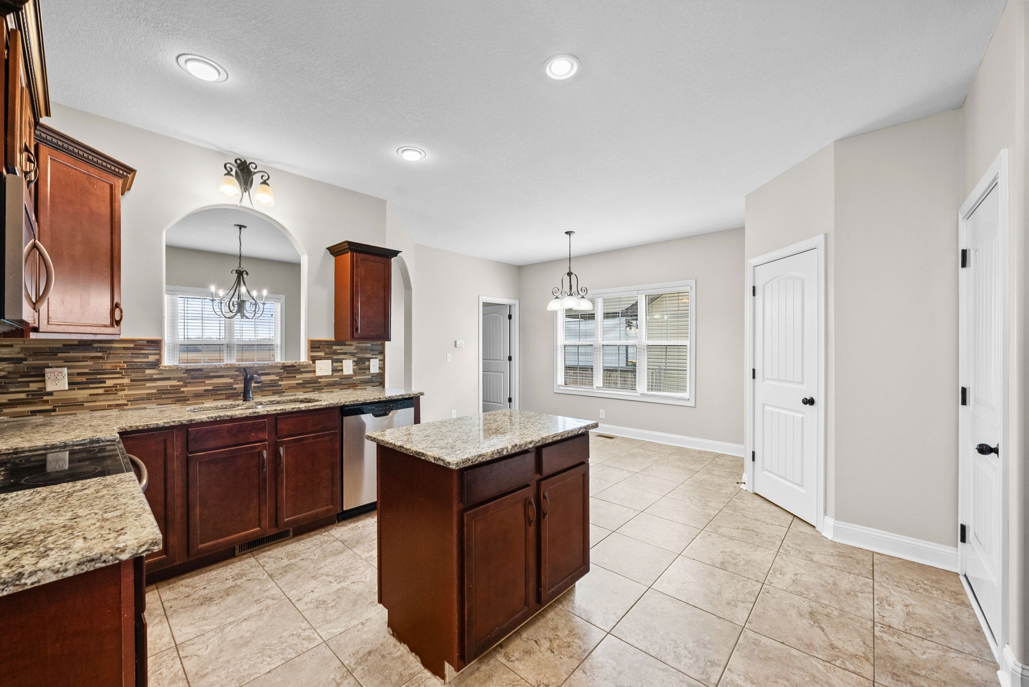 1900 Apache Way Clarksville, TN 37042 - Photo 22 of 50 a large kitchen with kitchen island a sink stainless steel appliances and cabinets