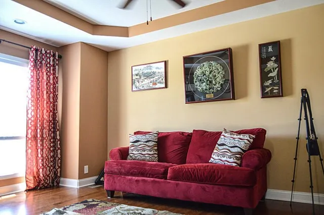 a living room with furniture and a window
