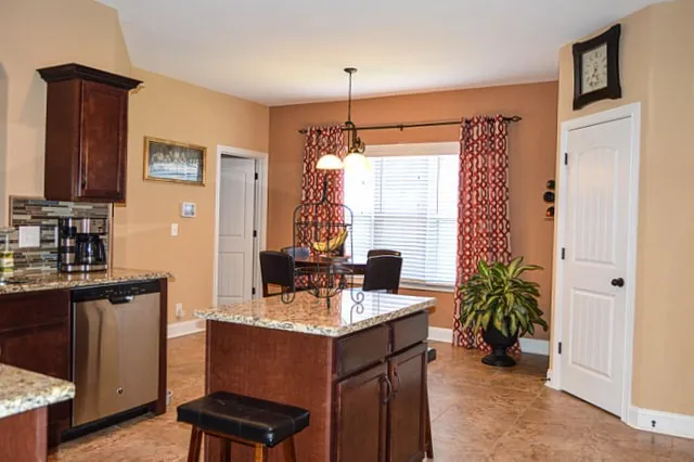 a room with furniture and a window