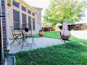 1424 Winston Drive McKinney, TX 75072 - Photo 26 of 28 a view of backyard with outdoor seating and green space