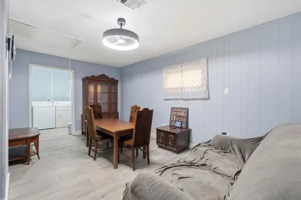 a view of a livingroom with furniture