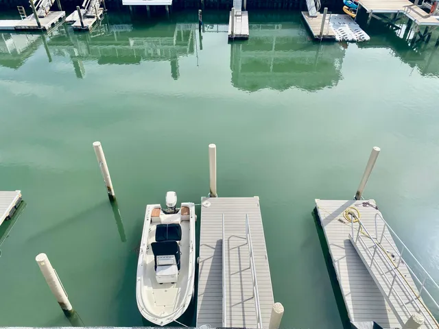 a kitchen with a stove and a refrigerator