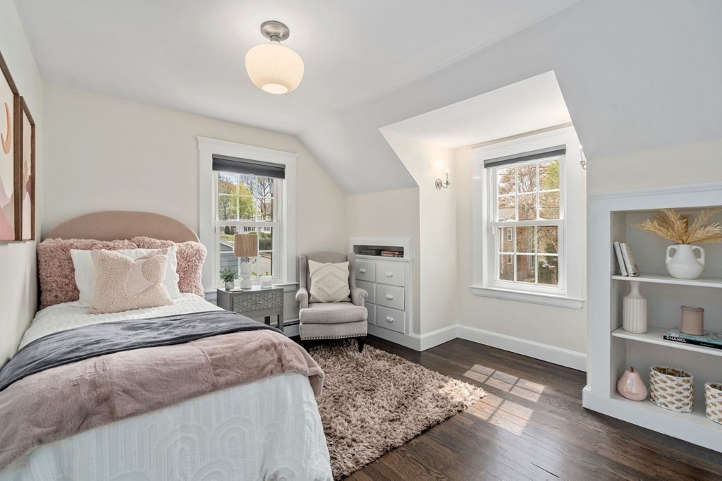 24 Tower Avenue Needham, MA 02494 - Photo 21 of 38 a bedroom with a bed and wooden floor