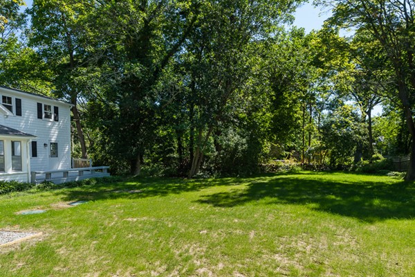76 A First Parish Road Scituate, MA 02066 - Photo 26 of 26 a view of a big yard with plants and large trees