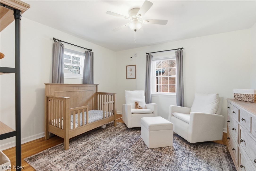 2552 Channing Road Cleveland, OH 44118 - Photo 14 of 33 Second bedroom featuring hardwood floors and ceiling fan.