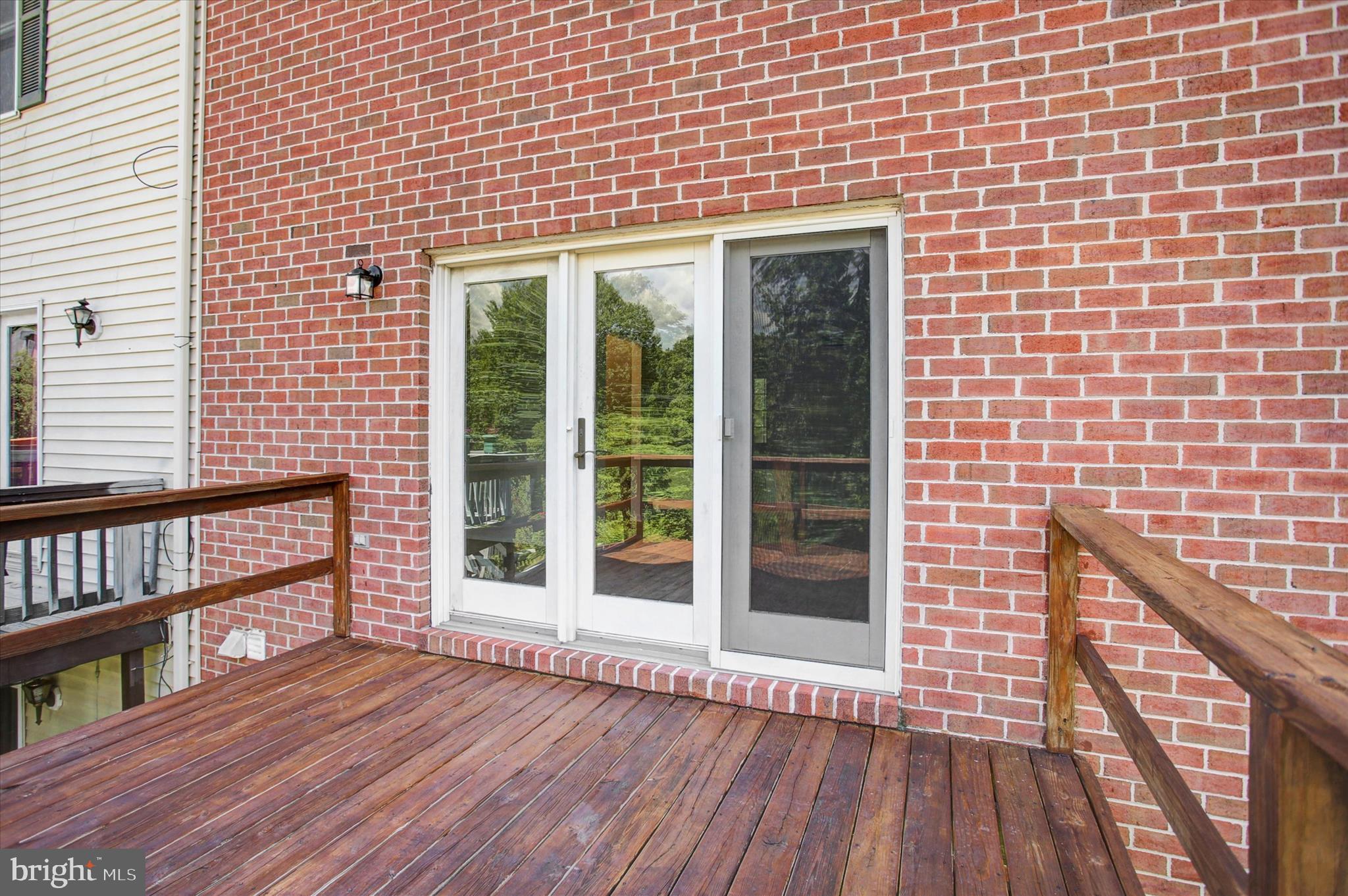 1553 Brechbill Road Chambersburg, PA 17202 - Photo 40 of 45 a view of a brick house with wooden floor