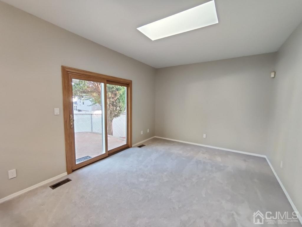 47 Brookside Road Edison, NJ 08817 - Photo 14 of 36 an empty room with windows