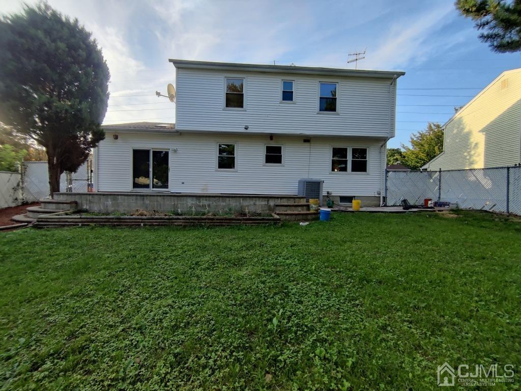 47 Brookside Road Edison, NJ 08817 - Photo 3 of 36 a front view of house with yard