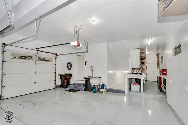 a view of a house with backyard porch and sitting area