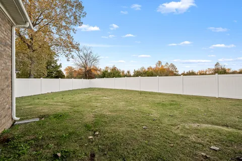 a view of patio and yard