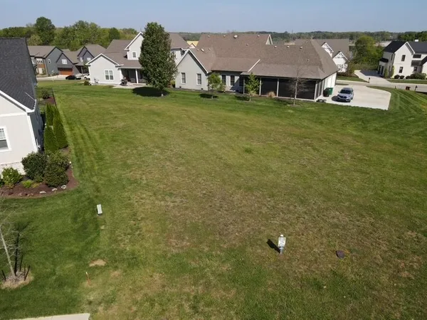 a view of a house with a big yard