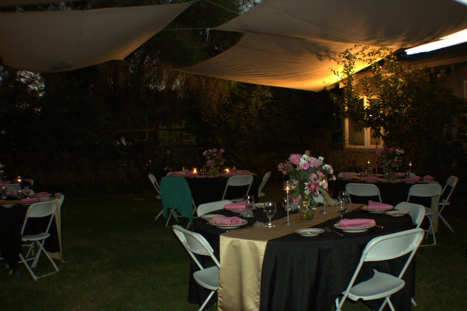 17036 North Locust Tree Road Lodi, CA 95240 - Photo 11 of 19 a outdoor dining space with furniture and potted plants