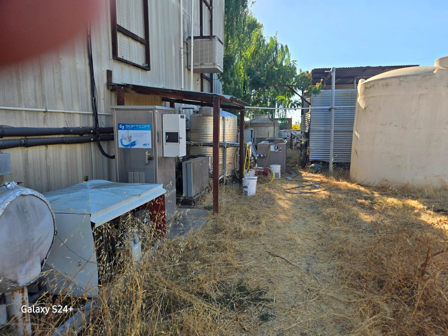 17036 North Locust Tree Road Lodi, CA 95240 - Photo 8 of 19 a view of a chairs and table in the patio