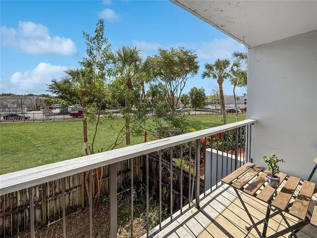 a room with a mirror and gym equipment