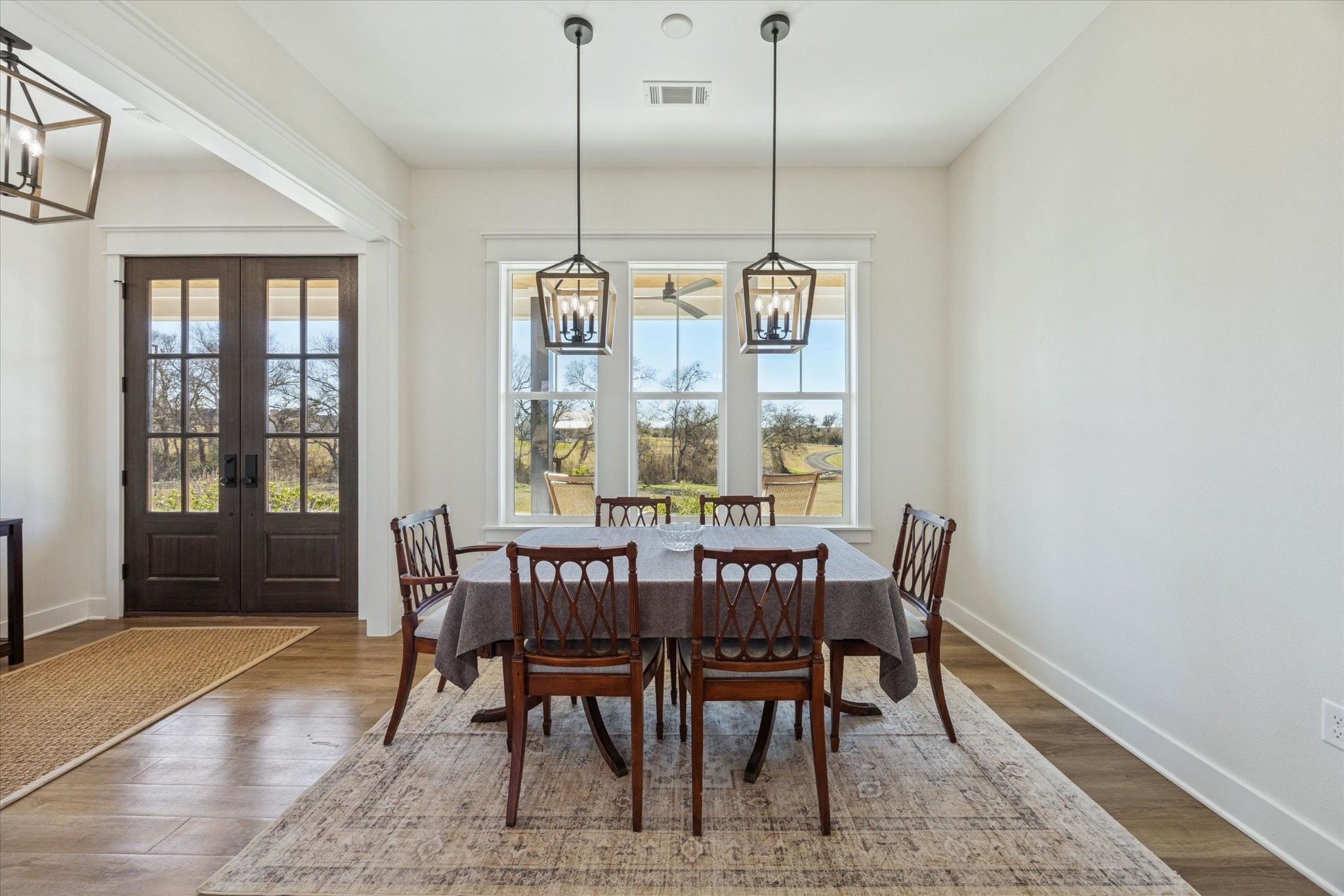 1009 Century Terrace Brenham, TX 77833 - Photo 19 of 49 a view of a dining room with furniture window and wooden floor