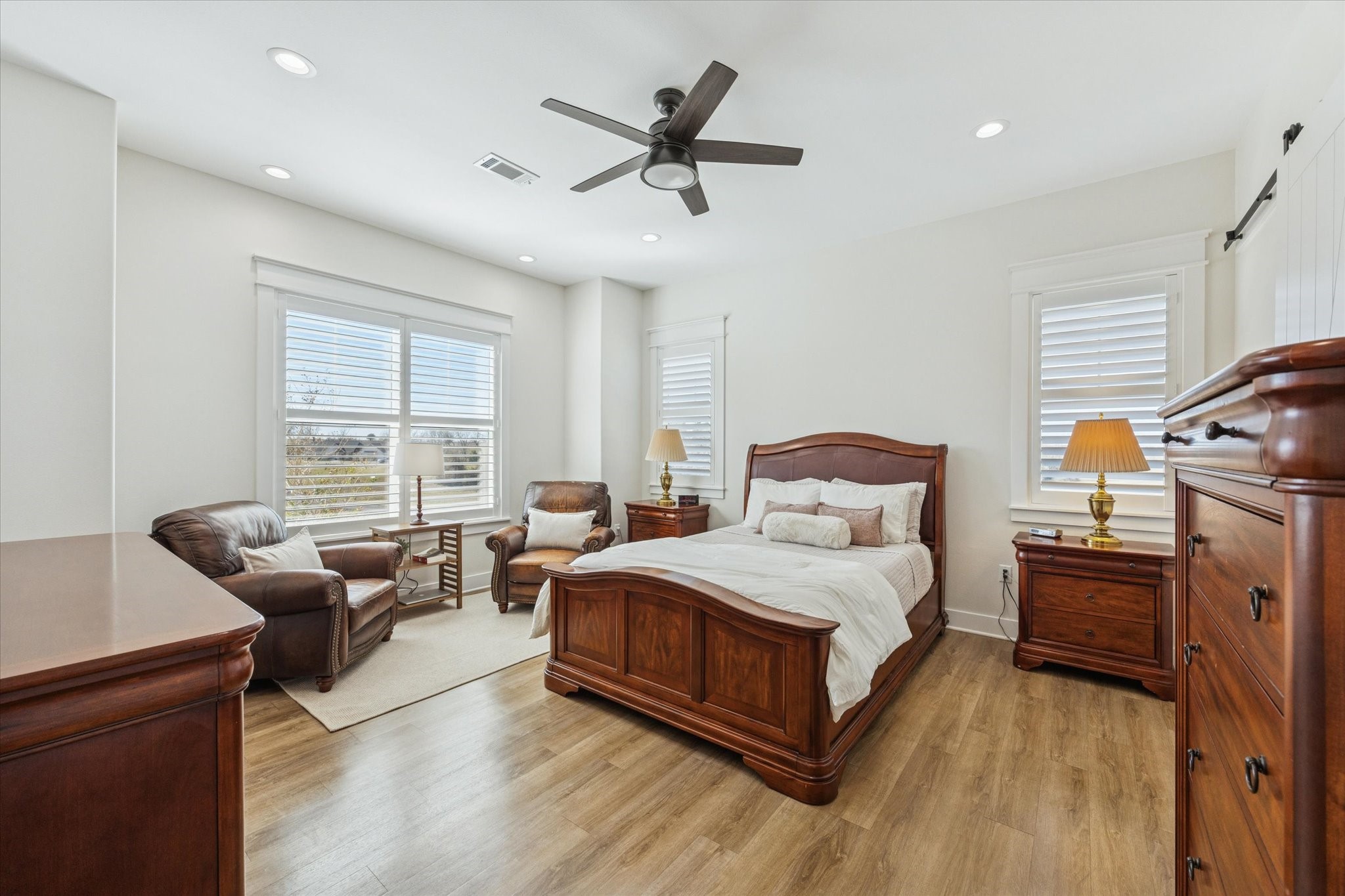 1009 Century Terrace Brenham, TX 77833 - Photo 21 of 49 a bedroom with a bed couch and window