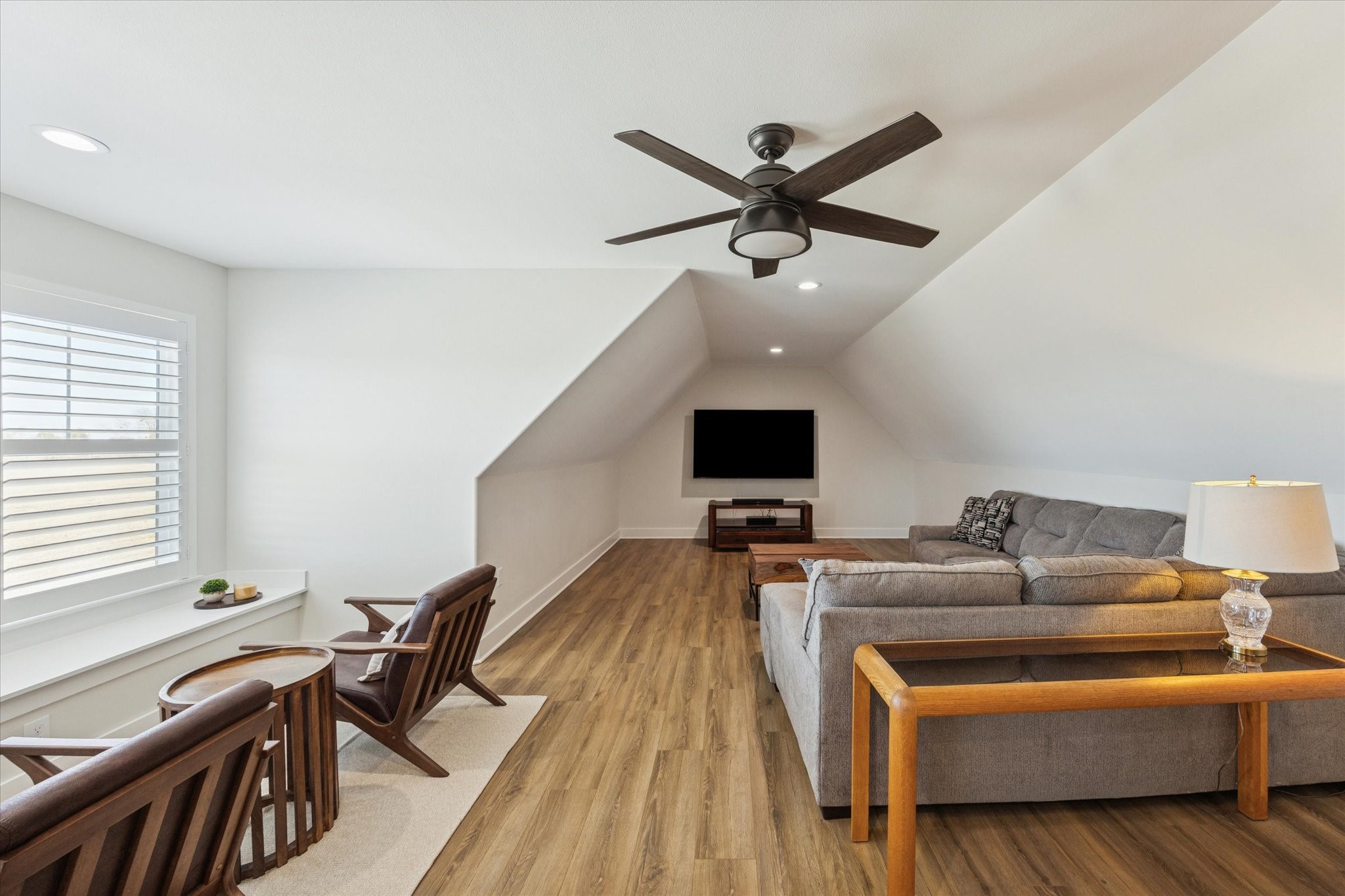 1009 Century Terrace Brenham, TX 77833 - Photo 27 of 49 a living room with furniture and a flat screen tv