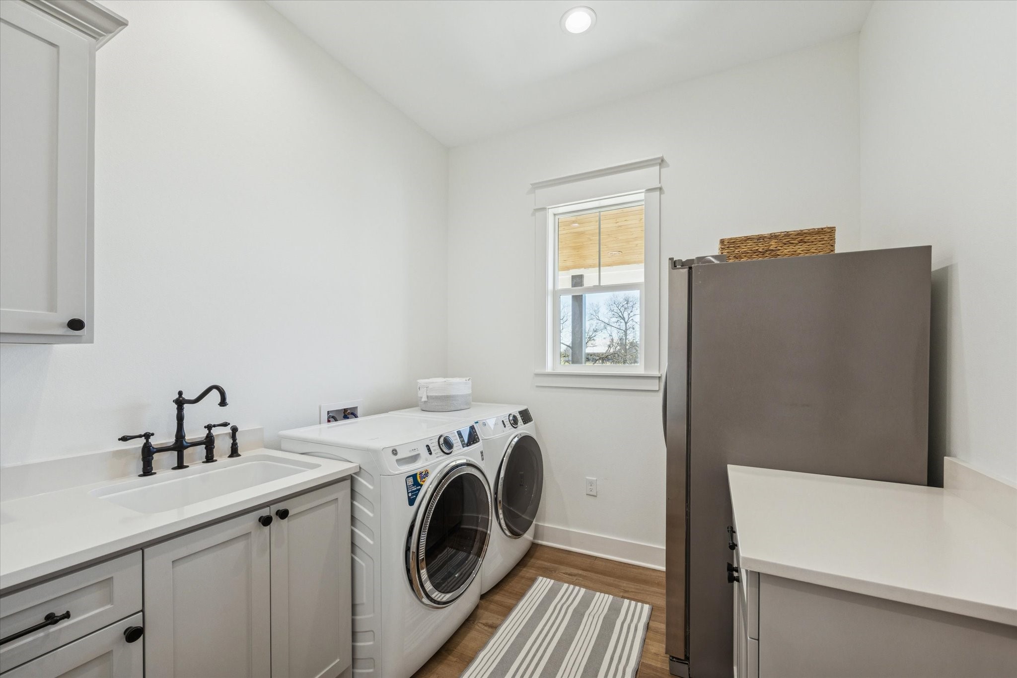1009 Century Terrace Brenham, TX 77833 - Photo 32 of 49 a utility room with dryer and washer
