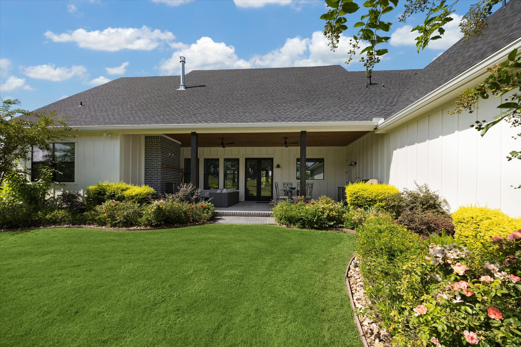 1009 Century Terrace Brenham, TX 77833 - Photo 42 of 49 a front view of a house with garden