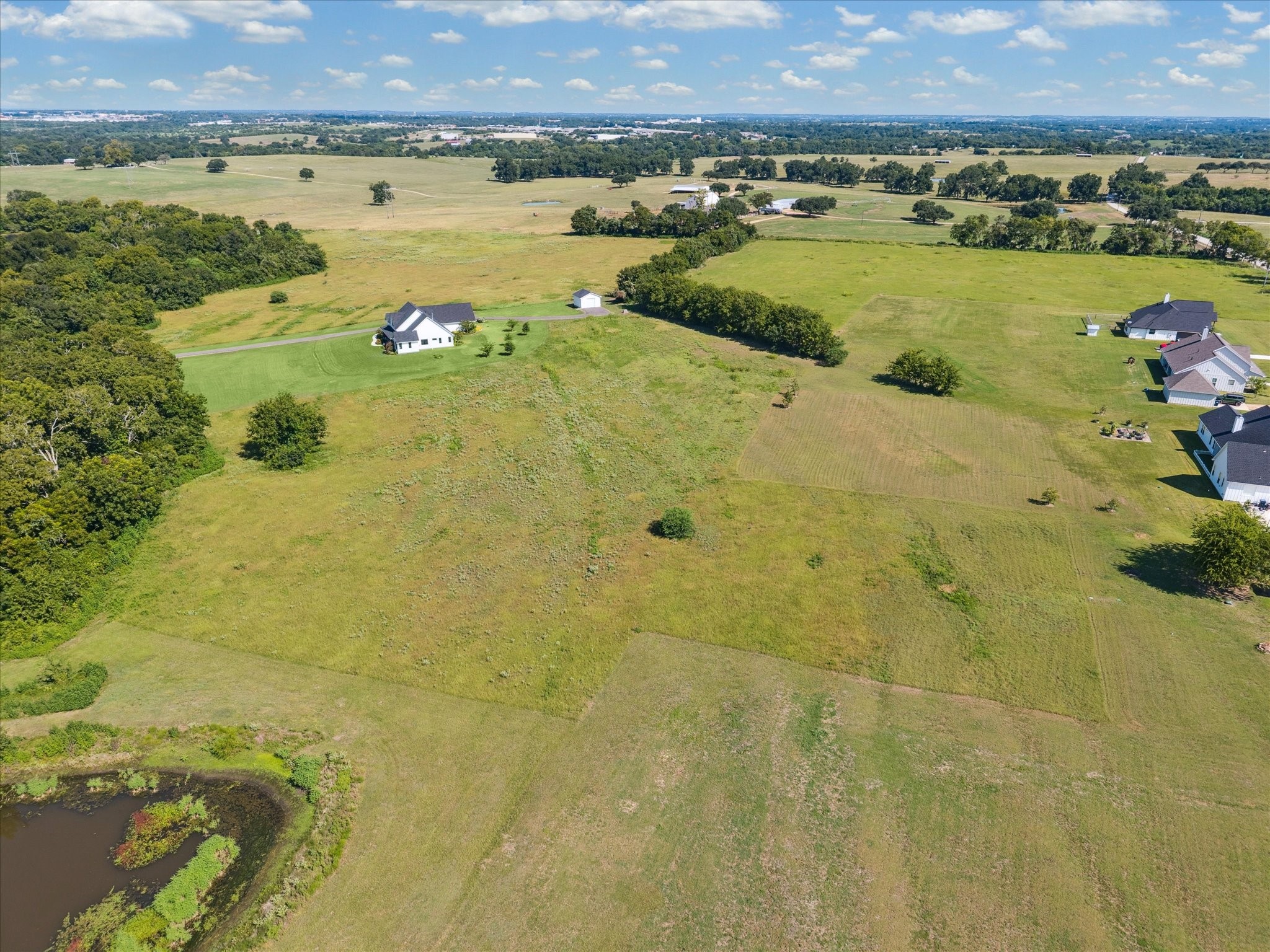 1009 Century Terrace Brenham, TX 77833 - Photo 49 of 49 a view of a lake with houses