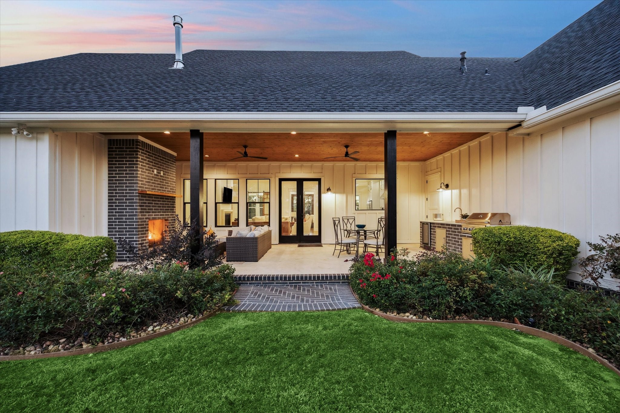 1009 Century Terrace Brenham, TX 77833 - Photo 7 of 49 a front view of a house with garden