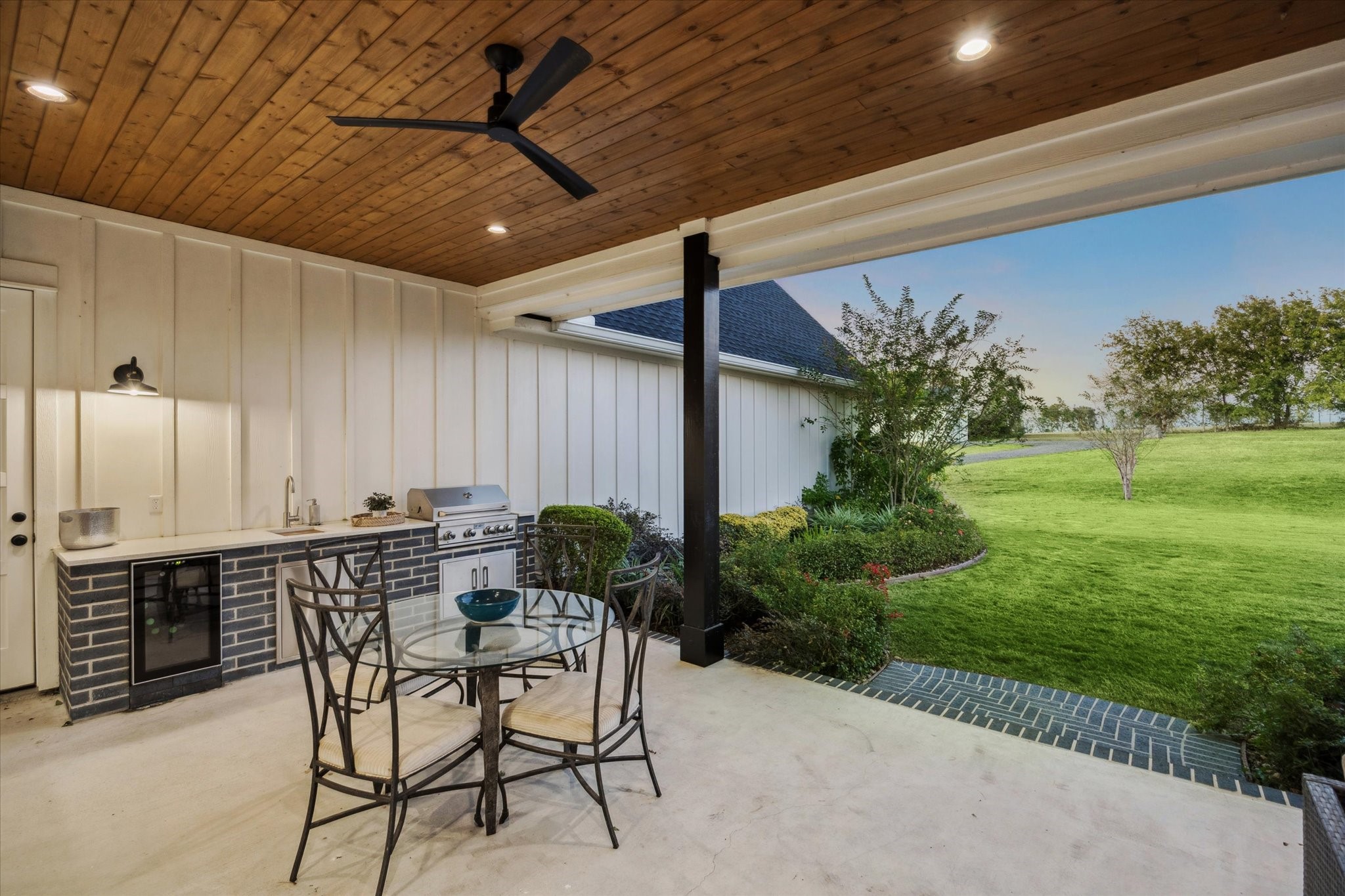 1009 Century Terrace Brenham, TX 77833 - Photo 9 of 49 a view of a backyard with plants and outdoor seating