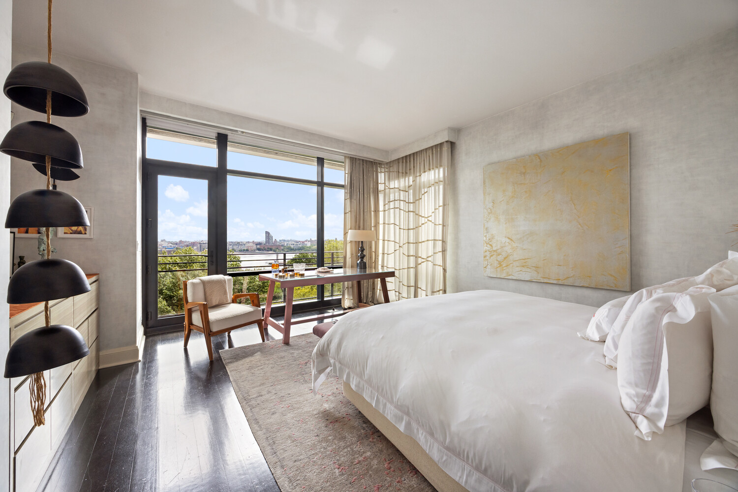 170 East End Avenue, Unit 8EF Manhattan, NY 10128 - Photo 13 of 31 a spacious bedroom with a bed and glass windows