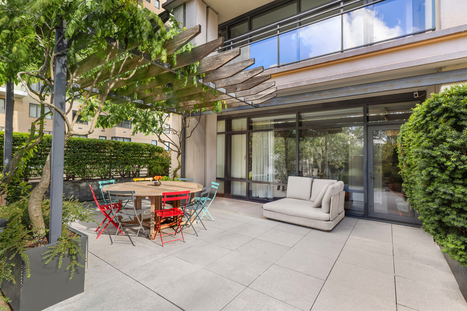 170 East End Avenue, Unit 8EF Manhattan, NY 10128 - Photo 27 of 31 a view of outdoor sitting area with furniture and garden view