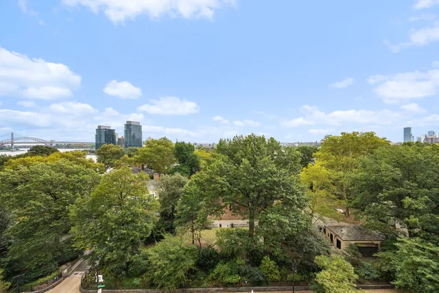 a view of outdoor sitting area with furniture and garden view