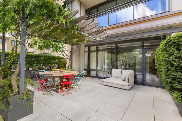 a view of yard with patio