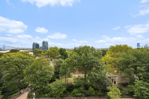 a view of outdoor sitting area with furniture and garden view