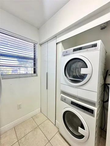 a view of a washer and dryer in a utility room