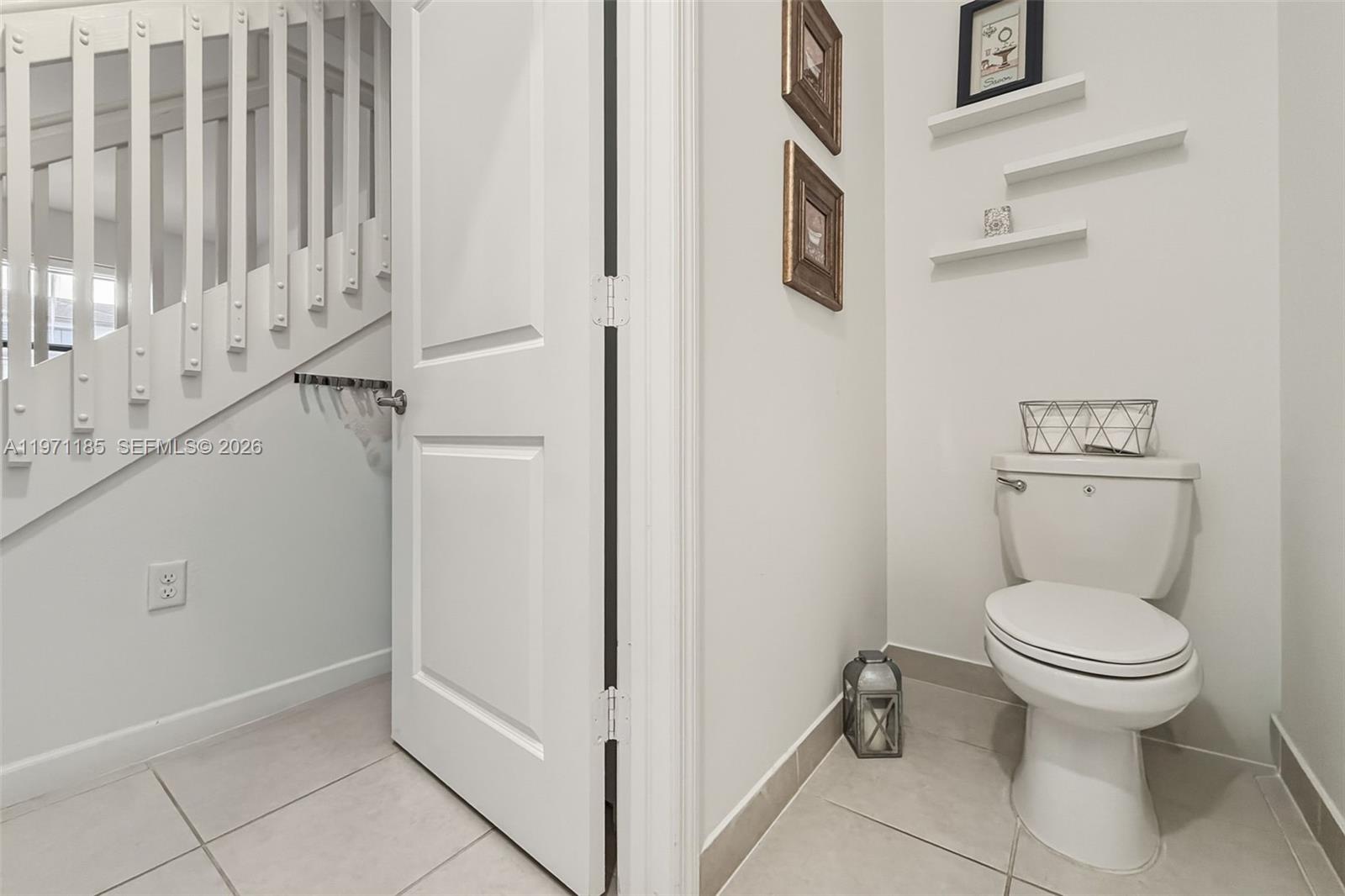 10009 Southwest 228th Terrace Miami, FL 33190 - Photo 14 of 48 a bathroom with a toilet and a shower