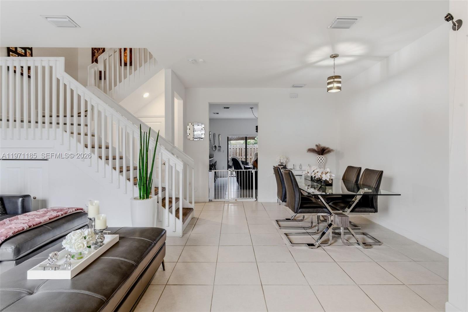 10009 Southwest 228th Terrace Miami, FL 33190 - Photo 4 of 48 a living room with furniture