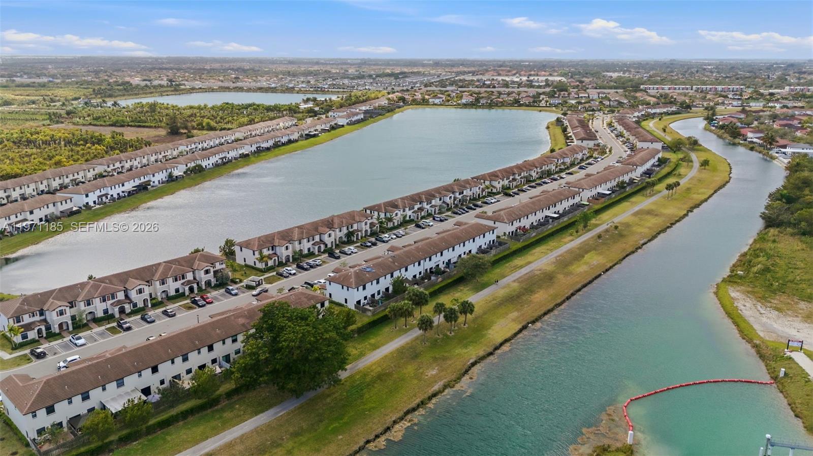 10009 Southwest 228th Terrace Miami, FL 33190 - Photo 48 of 48 a view of a city and a lake view