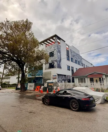 a car parked in front of a building