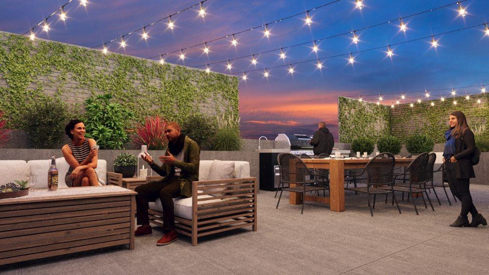 355 Northwest 31st Street, Unit 203 Miami, FL 33127 - Photo 9 of 9 a view of a tables and chairs in patio