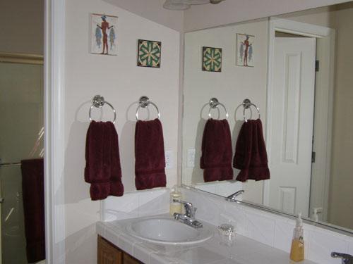 3688 Lawrence Road Redding, CA 96002 - Photo 8 of 14 a bathroom with a sink and a mirror