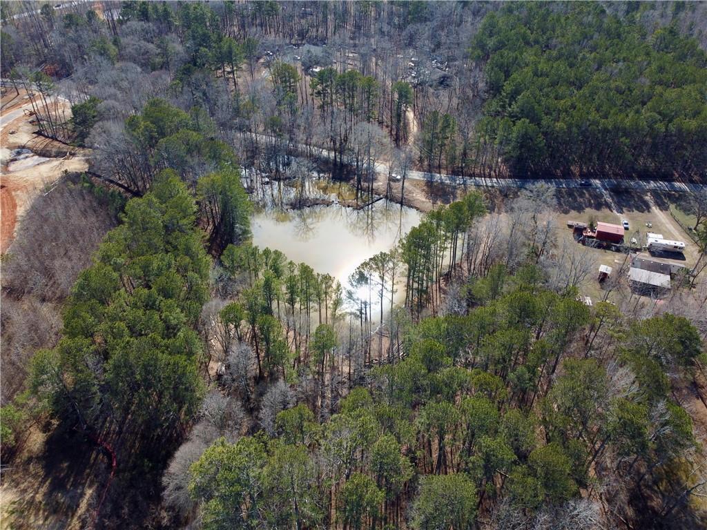 2020 Bailey Creek Road Covington, GA 30016 - Photo 15 of 17 a view of swimming pool with outdoor seating and green space
