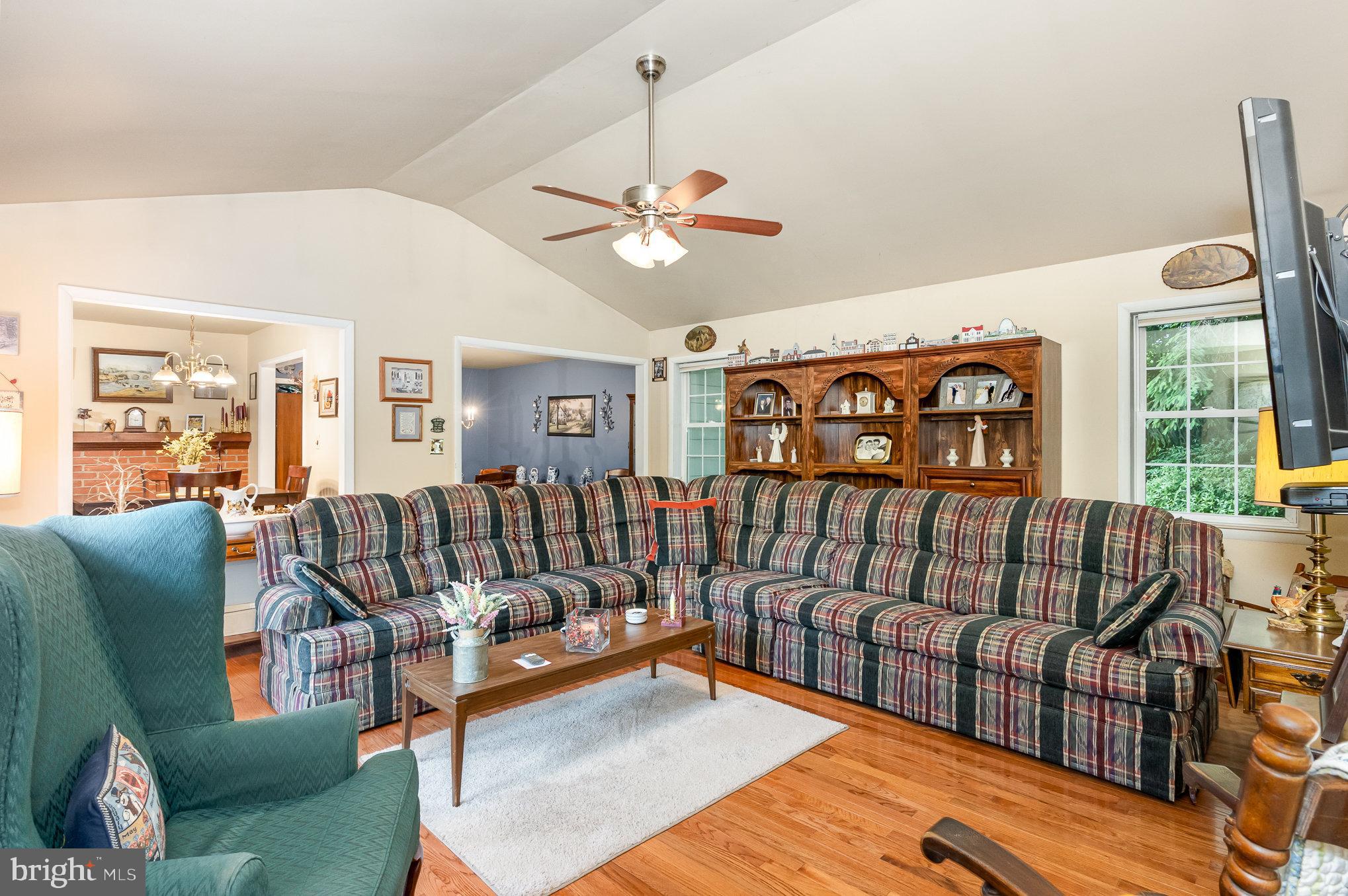 417 Ray Mar Road Oxford, PA 19363 - Photo 14 of 34 a living room with furniture ceiling fan and a window