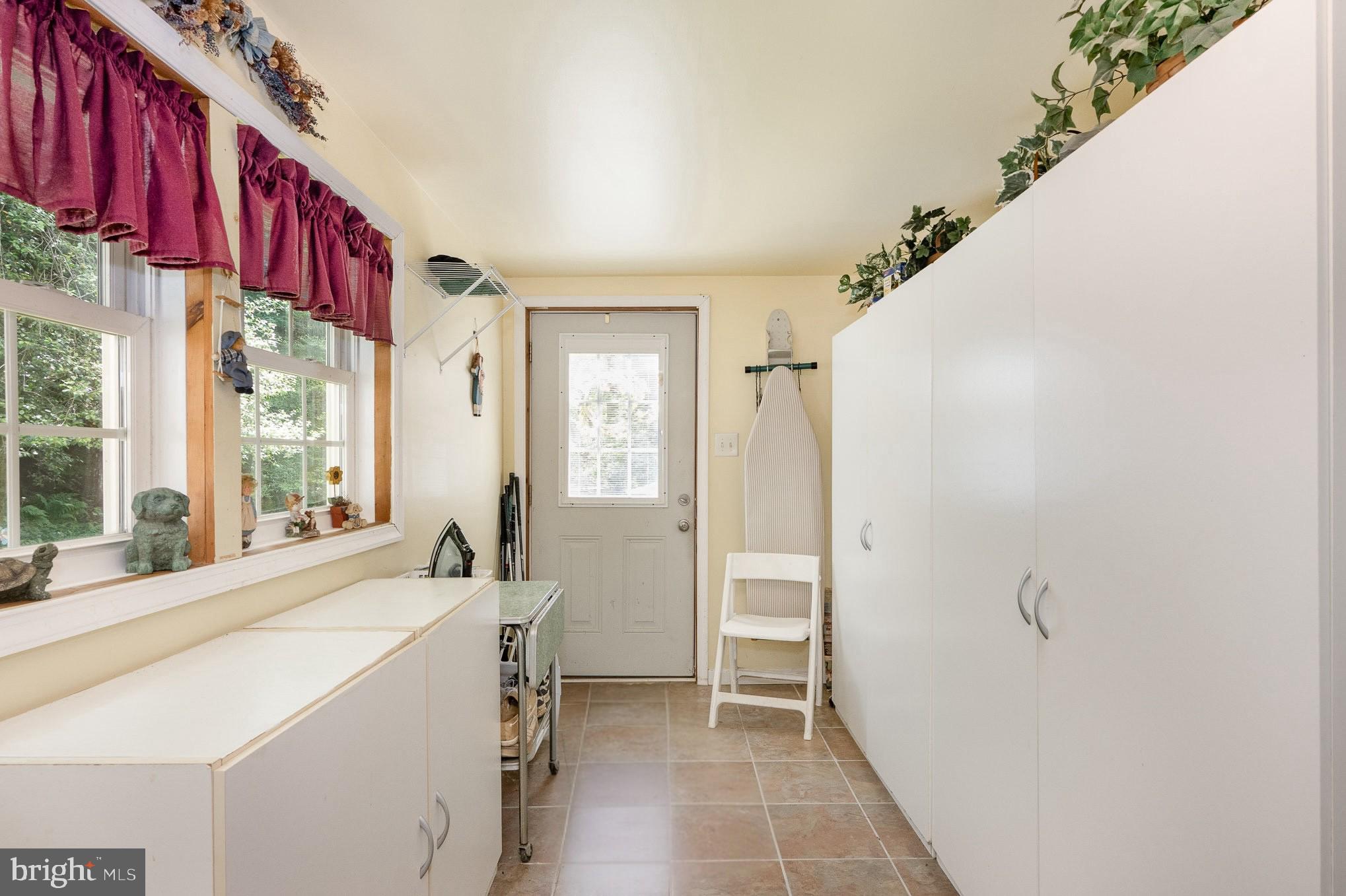 417 Ray Mar Road Oxford, PA 19363 - Photo 24 of 34 a view of a bathroom with tub and windows