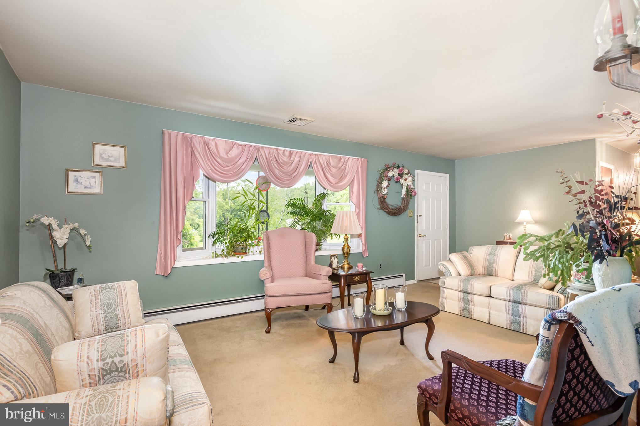 417 Ray Mar Road Oxford, PA 19363 - Photo 4 of 34 a living room with furniture and a large window