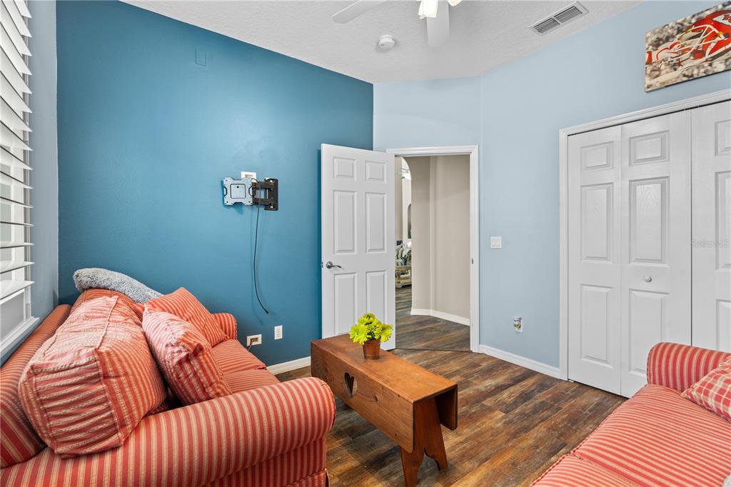 14624 Kitlanselt Way Orlando, FL 32828 - Photo 26 of 42 a bedroom with furniture and a bed