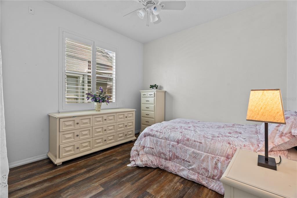 14624 Kitlanselt Way Orlando, FL 32828 - Photo 28 of 42 a bedroom with a bed and a window