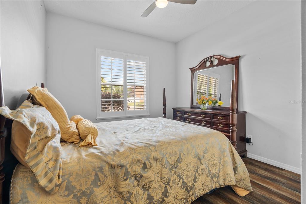 14624 Kitlanselt Way Orlando, FL 32828 - Photo 29 of 42 a bedroom with a bed and a window