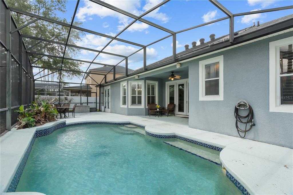 14624 Kitlanselt Way Orlando, FL 32828 - Photo 34 of 42 a view of a house with swimming pool