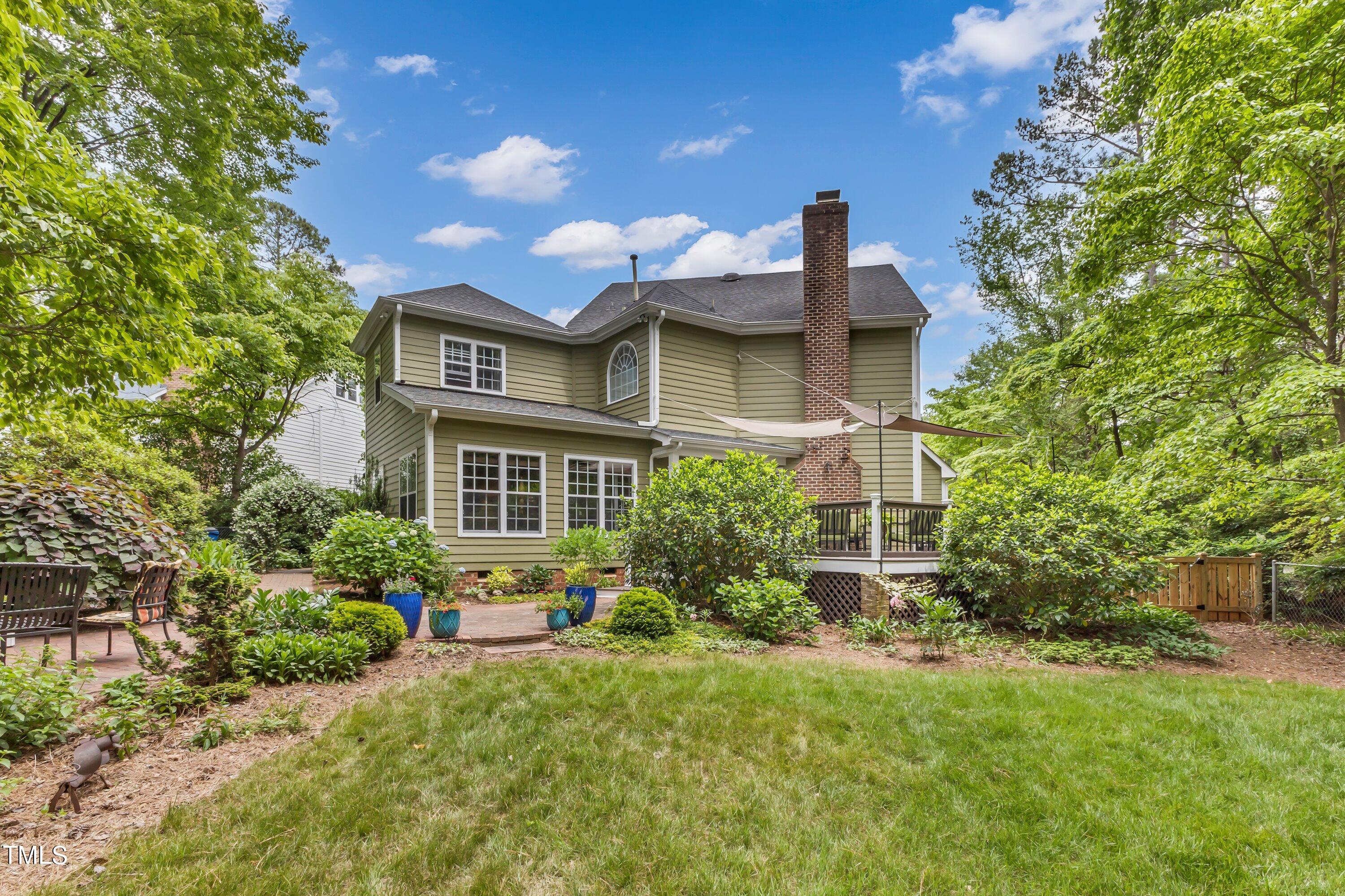 6105 Montcastle Court Raleigh, NC 27612 - Photo 36 of 44 a front view of a house with a yard