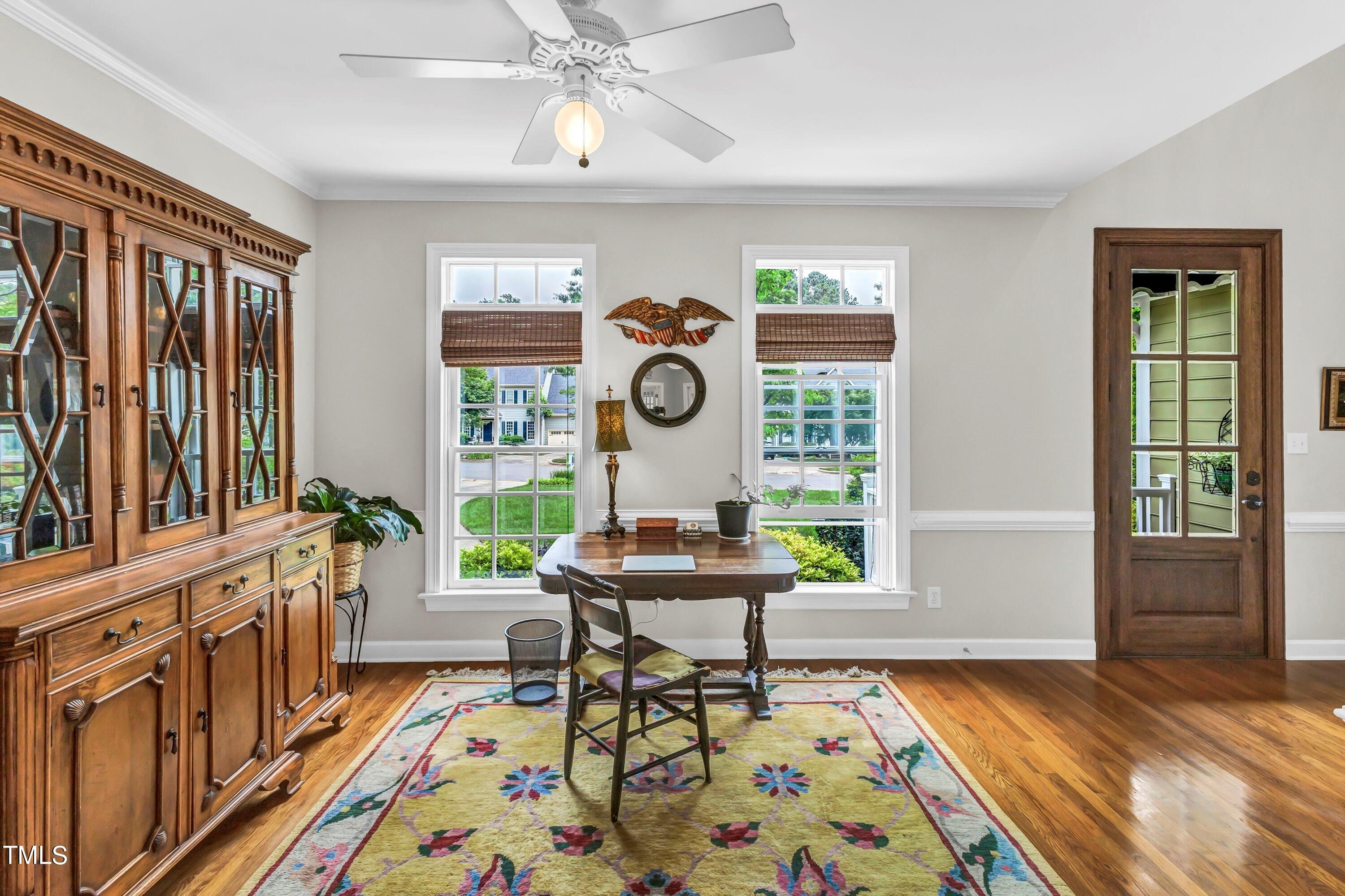 6105 Montcastle Court Raleigh, NC 27612 - Photo 6 of 44 a living room with furniture and a window