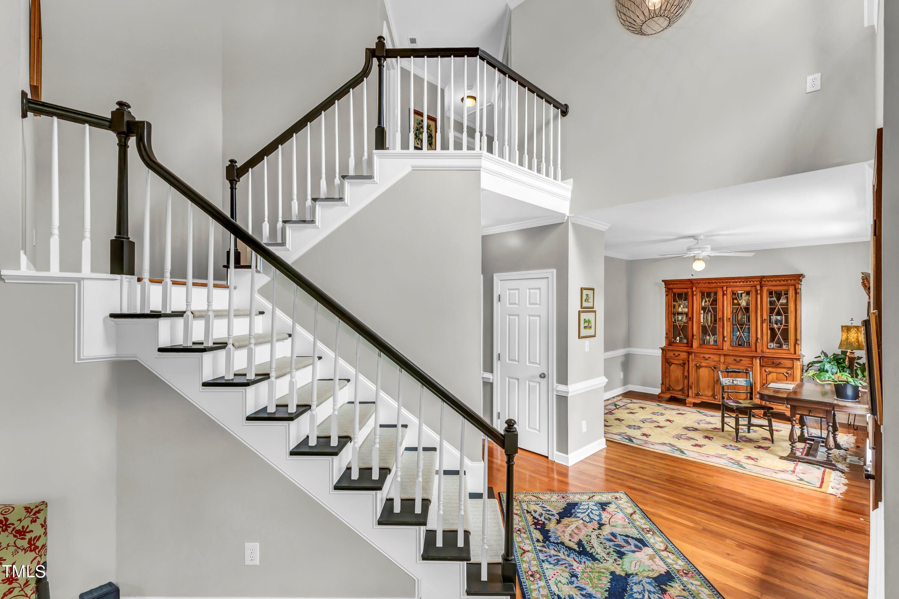 6105 Montcastle Court Raleigh, NC 27612 - Photo 7 of 44 a view of an entryway and wooden floor
